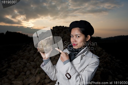 Image of beautiful asian with sugar beet