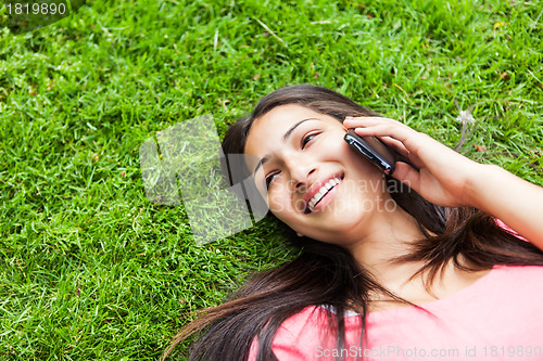 Image of Hispanic college student on the phone