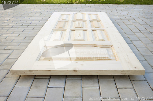 Image of Wooden door made of coniferous tree