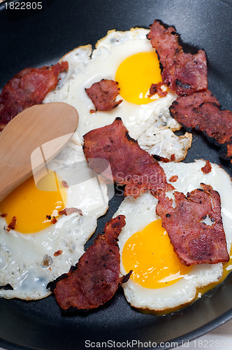 Image of eggs bacon and toast bread