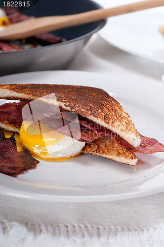 Image of eggs bacon and toast bread