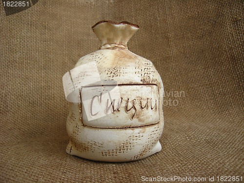 Image of Ceramic bag on a brown background