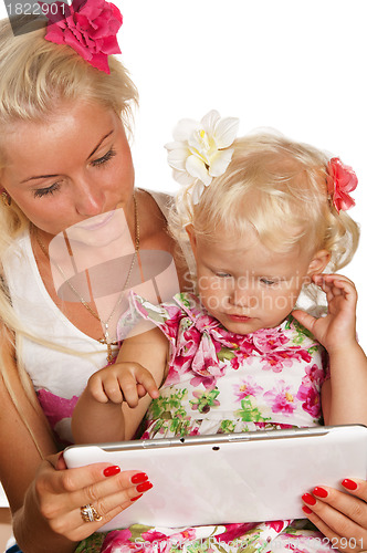 Image of mother and daughter looking tablet, isolated on white