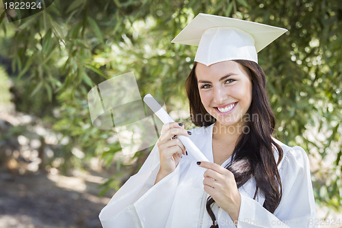 Image of Graduating Mixed Race Girl In Cap and Gown with Diploma