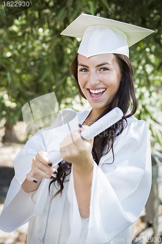 Image of Graduating Mixed Race Girl In Cap and Gown with Diploma