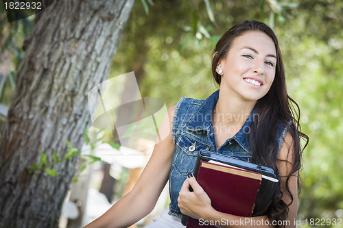Image of Mixed Race Young Girl Student with School Books 