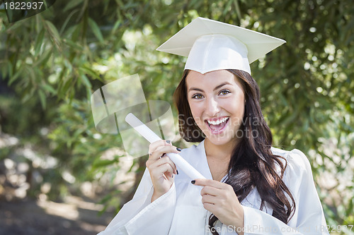 Image of Graduating Mixed Race Girl In Cap and Gown with Diploma