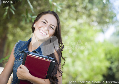 Image of Mixed Race Young Girl Student with School Books 