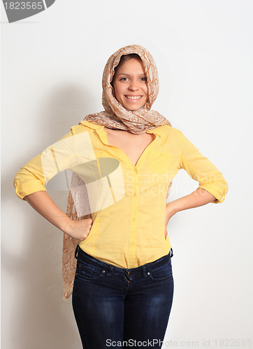 Image of beautiful young smiling woman with a scarf hippie