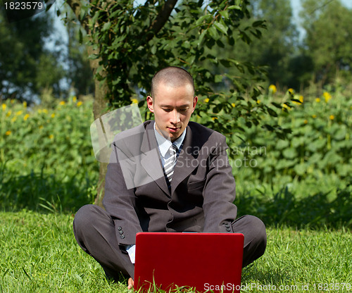 Image of Businessman Working Outdoors