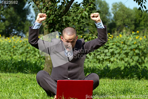 Image of Businessman Working Outdoors