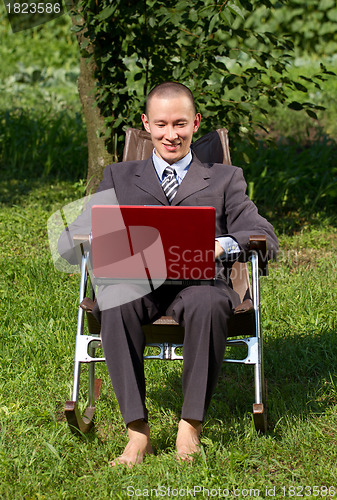 Image of Businessman Working Outdoors