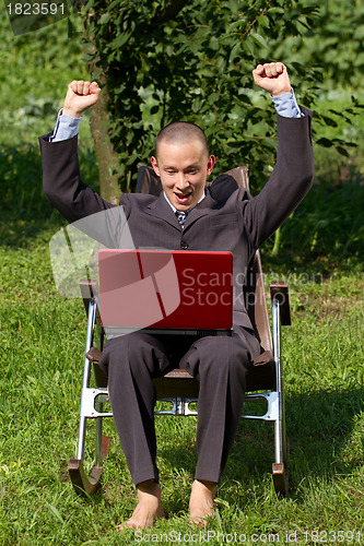 Image of Businessman Working Outdoors