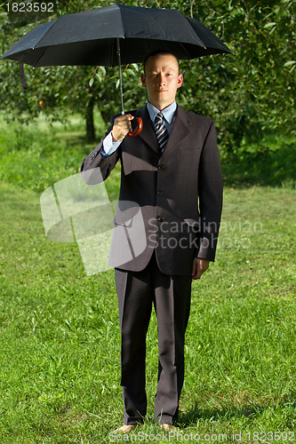 Image of Businessman Working Outdoors