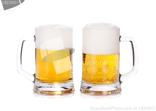 Image of Two beer mugs isolated on a white background