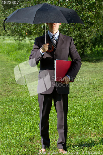 Image of Businessman Working Outdoors