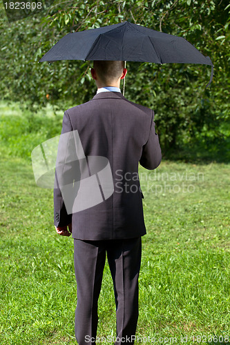 Image of Businessman Working Outdoors