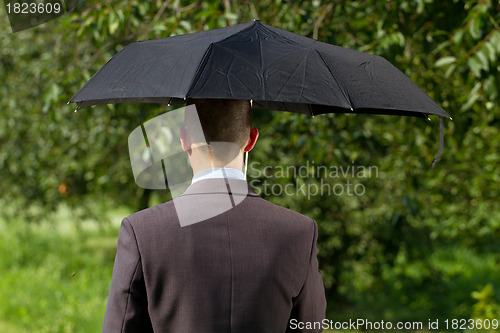 Image of Businessman Working Outdoors