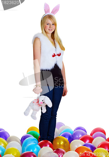 Image of Young woman with a toy rabbit