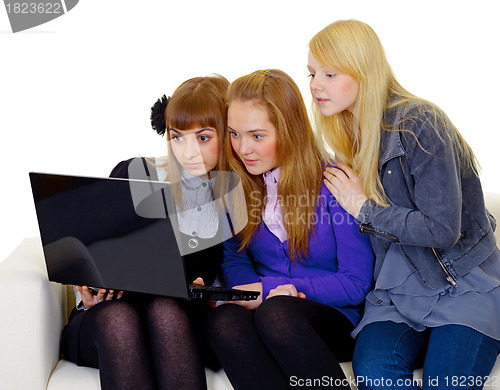 Image of Female teenagers with a laptop