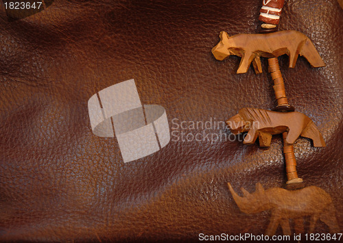 Image of Leather background with African ornaments