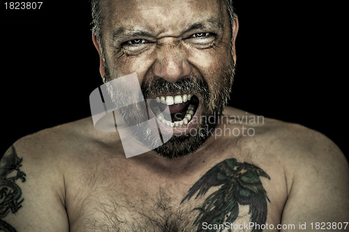 Image of angry man with beard