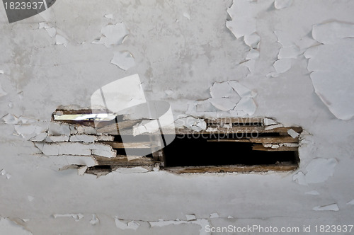 Image of broken wooden ceiling