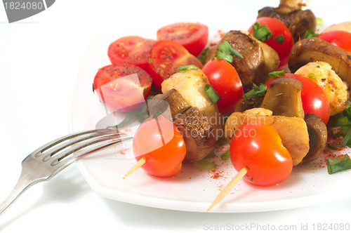 Image of Roasted chicken with mushrooms and tomatoes 