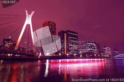 Image of suspension bridge and ship