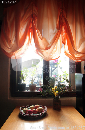 Image of A table with apples in an old farmhouse