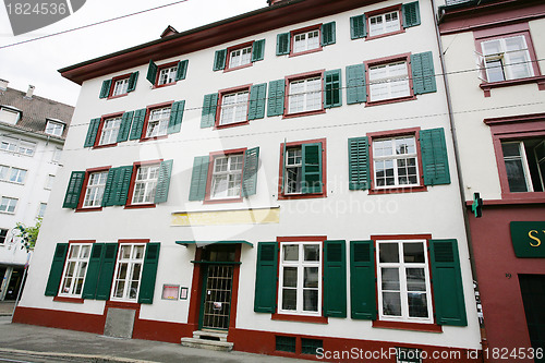 Image of house and street of european town 