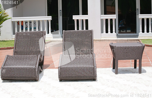 Image of Lounge chairs in the garden