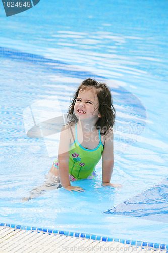 Image of happy girl in the swimming in swimming suit 