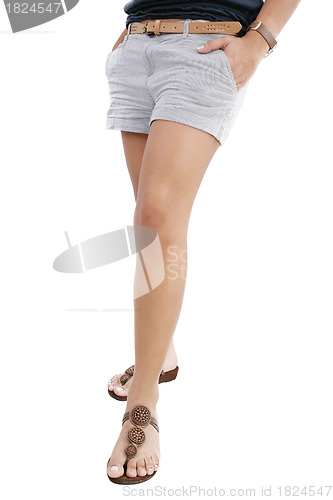 Image of Woman legs with hot pants on white background 