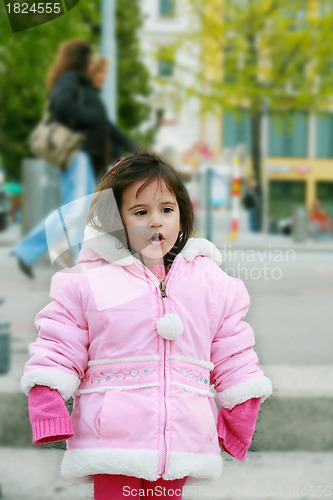 Image of portrait young girl walking in winter park