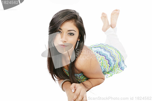 Image of woman lying on the floor and smiling