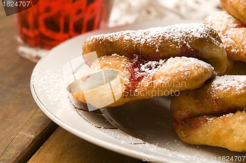 Image of Dough with marmelade on wooden board