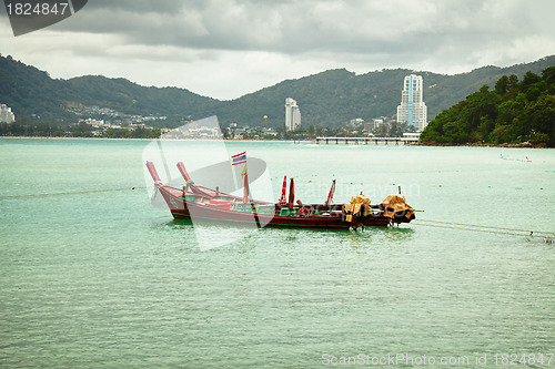 Image of Thai longtail boats near Patong. Thailand