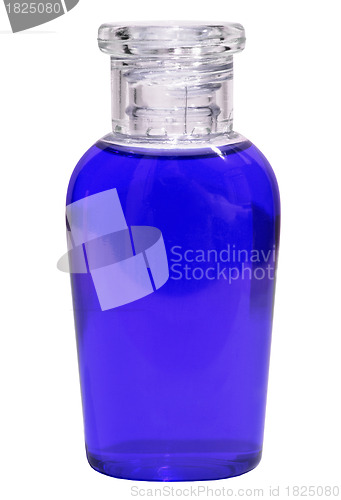 Image of Small bottle with blue liquid on white background