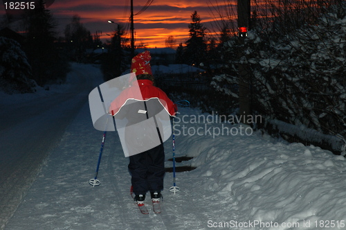 Image of ski at sunset