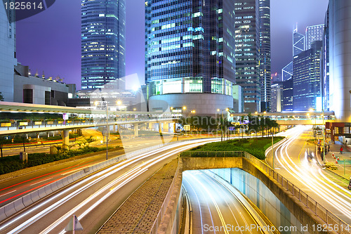 Image of traffic with blur light through city at night