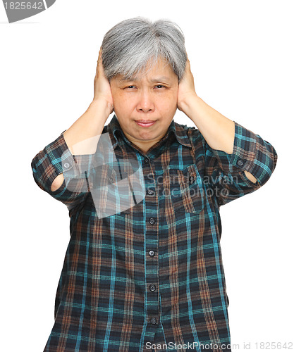 Image of asian mature woman closing ears with hands