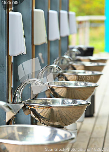 Image of sinks and taps outdoor