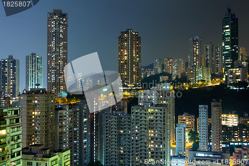 Image of Hong Kong with crowded buildings at night