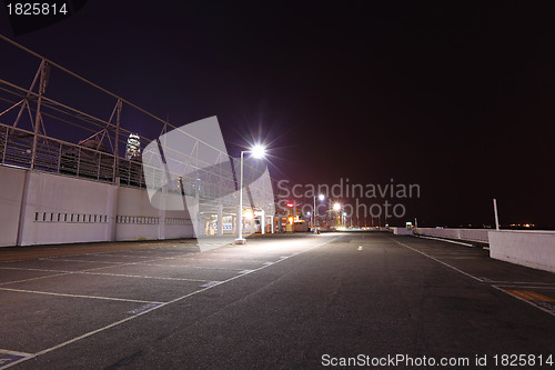 Image of car parking lot at night