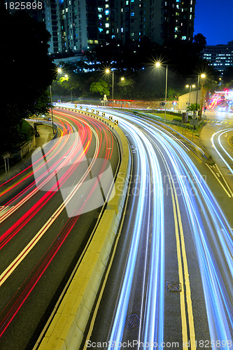 Image of urban city with car light