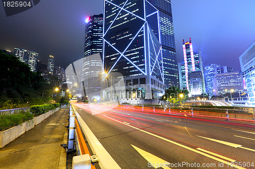 Image of traffic with blur light through city at night