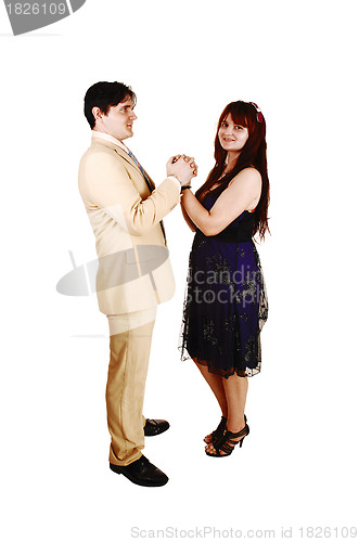 Image of Couple holding hands.