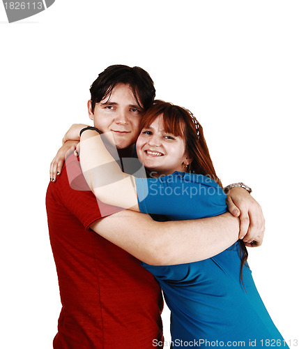 Image of Hugging couple in closeup.