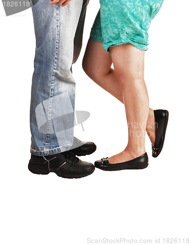 Image of Legs and feet of couple.